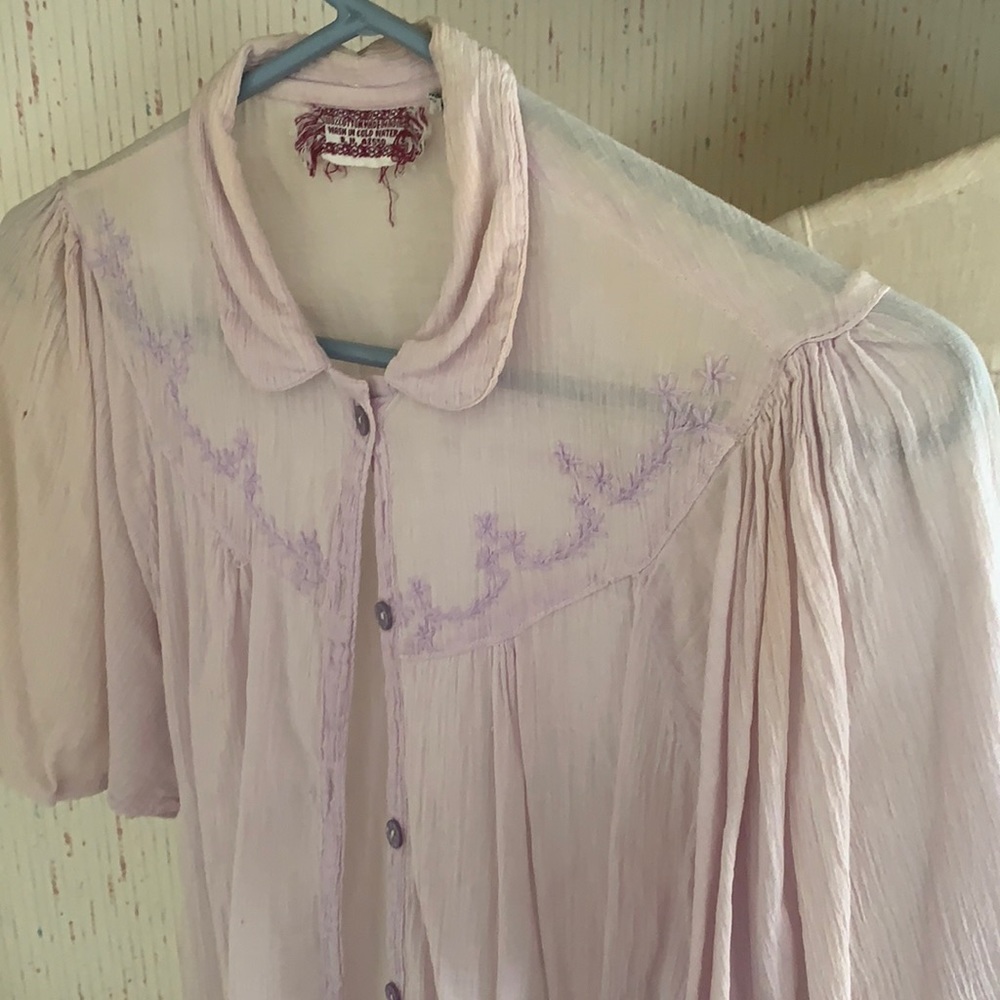 Vintage top. Very light purple with designs.